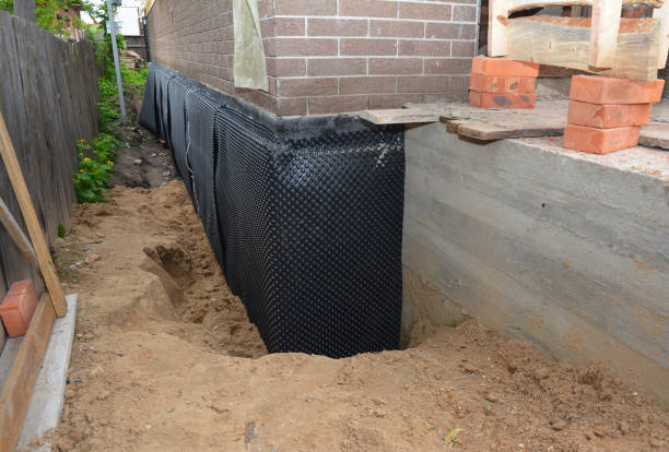 SJ Waterproofing Pros technician performing targeted Vapor Barrier Installation assessment in Roundhead, OH